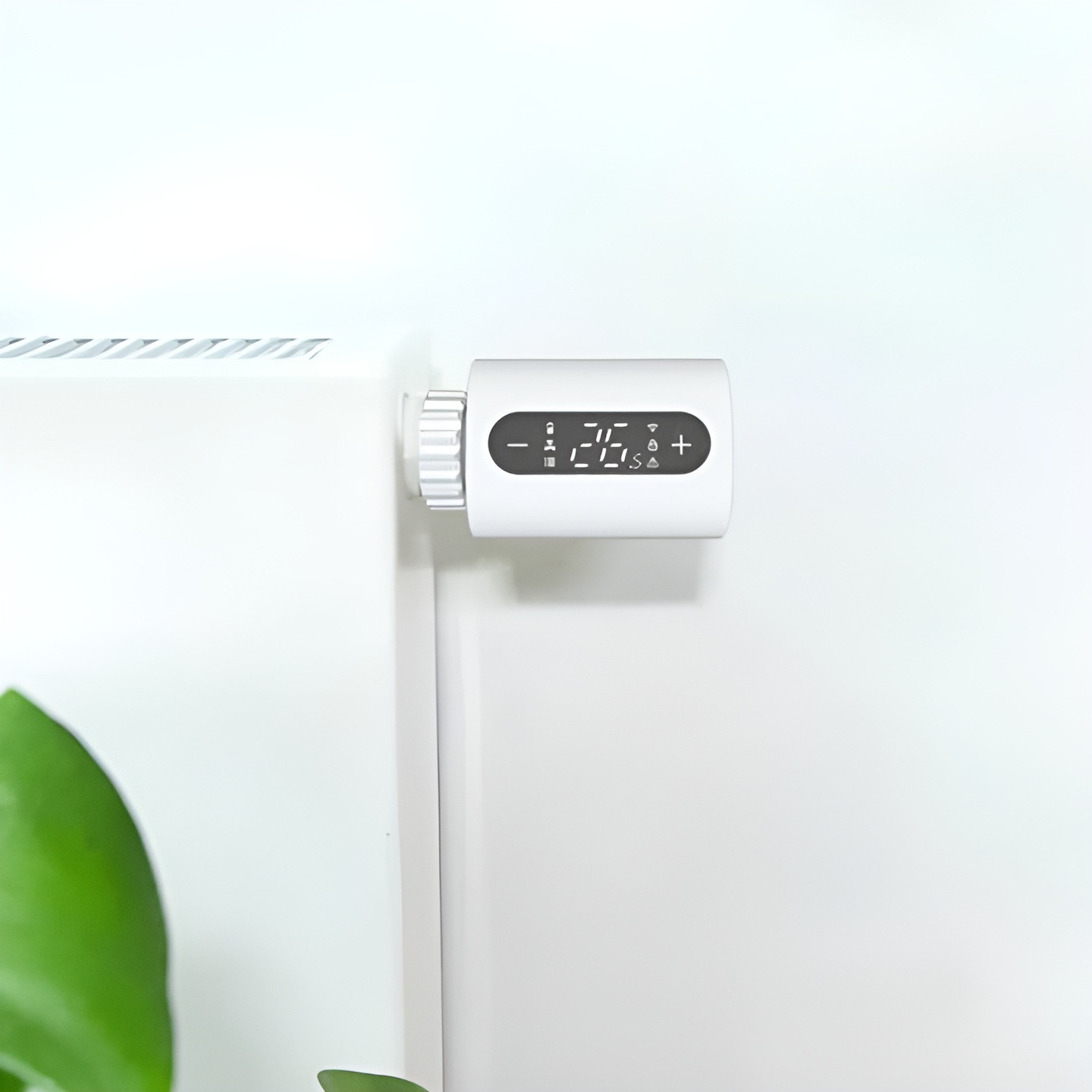 WiFi termostat på radiator Smart termostat på radiator med plante