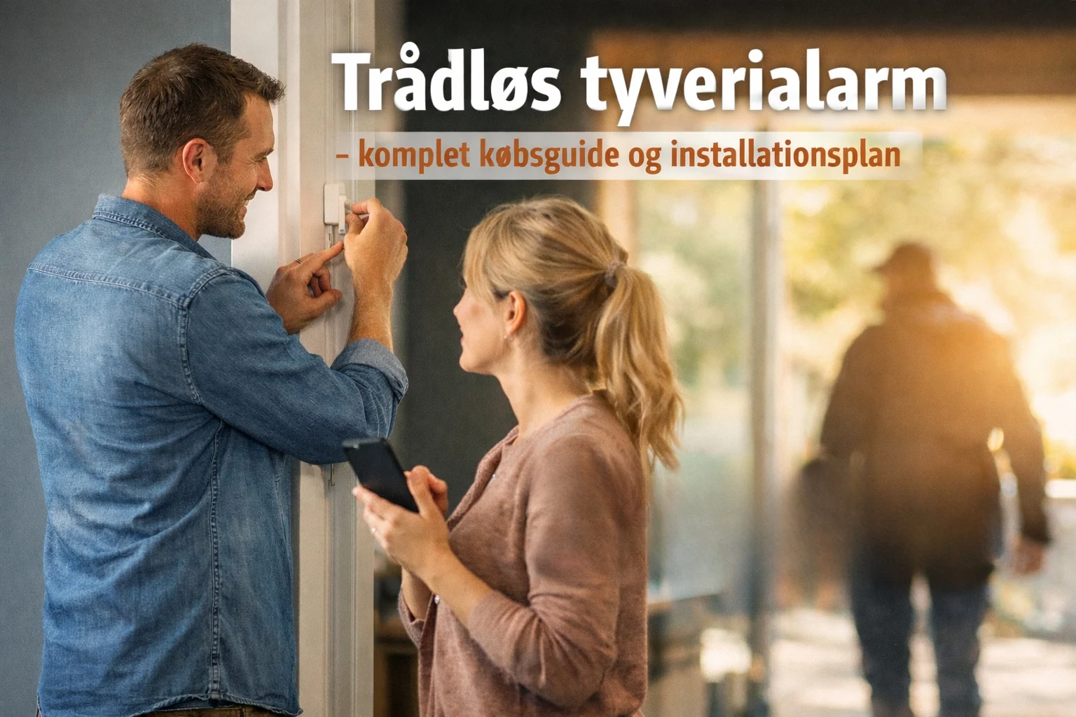 billedet viser et par i gang med at sætte en komplet trådløs tyverialarm op i hjemmet